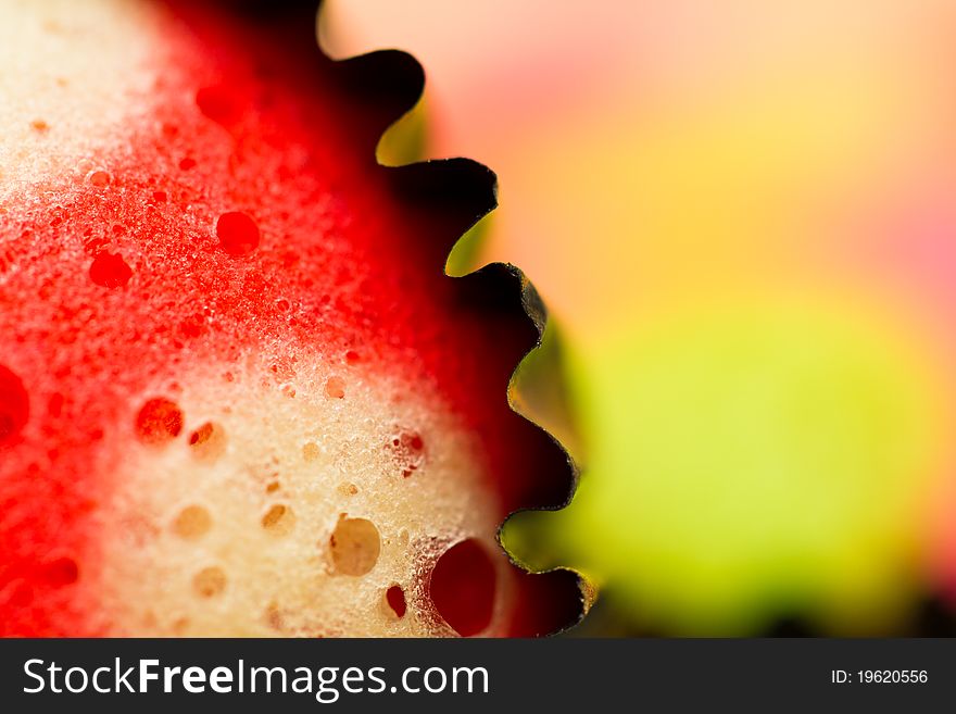 Extreme close up view of the delicious colorful cup cakes showing craters. Extreme close up view of the delicious colorful cup cakes showing craters