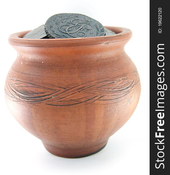 Clay pot with ancient coins