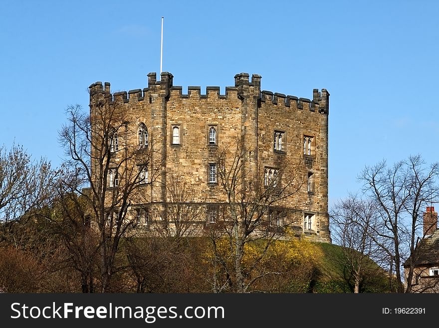 Durham Castle against a clear blue sky