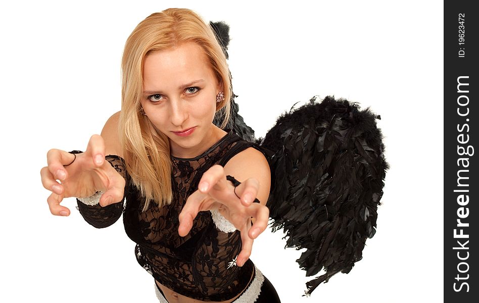 Model in costume of black angel posing for photo