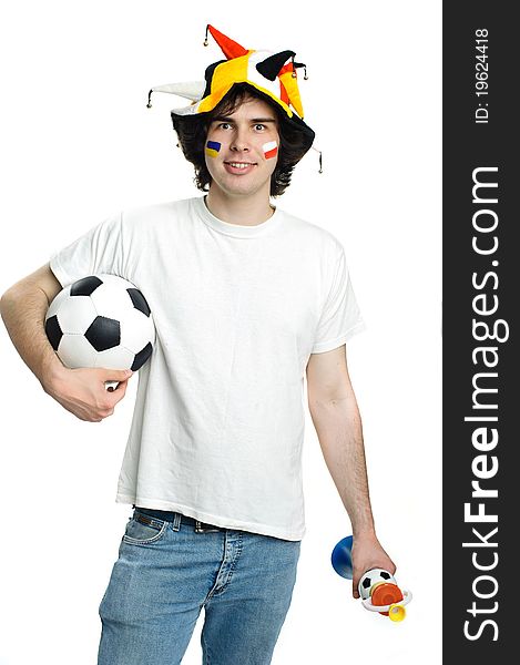 Football fan with ball and trumpet