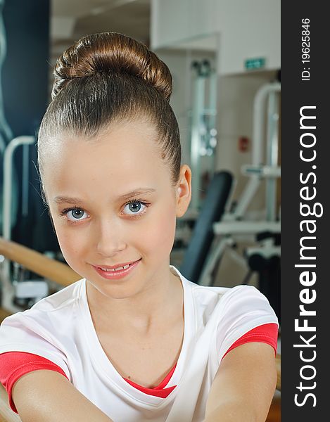 Portrait of young beauty gymnast in gymnasium. Portrait of young beauty gymnast in gymnasium