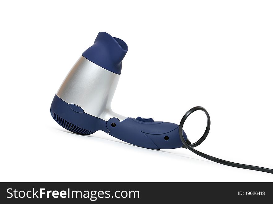 Small hair dryer isolated on white background. Clipping path is included. Small hair dryer isolated on white background. Clipping path is included