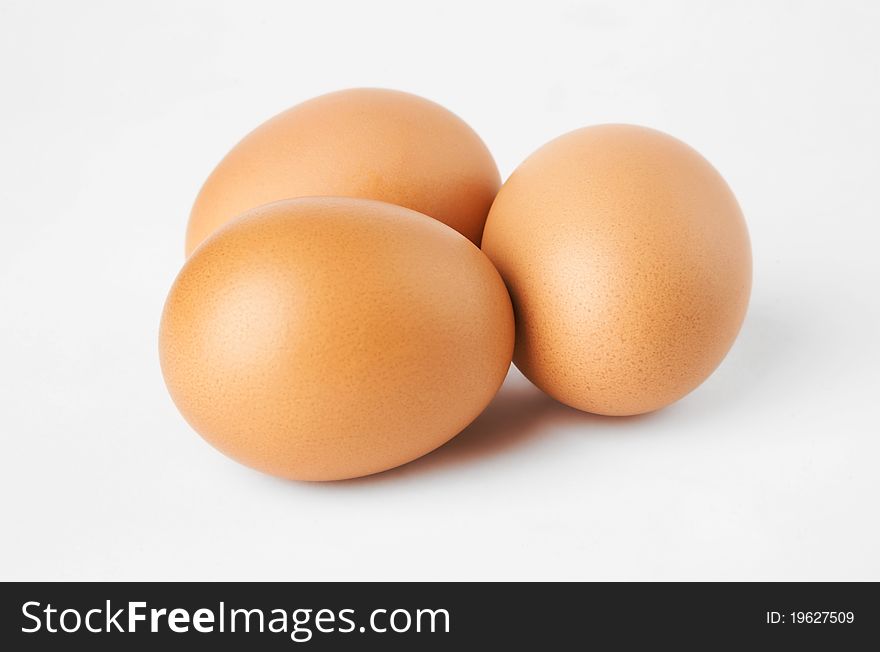 Three Eggs On A White