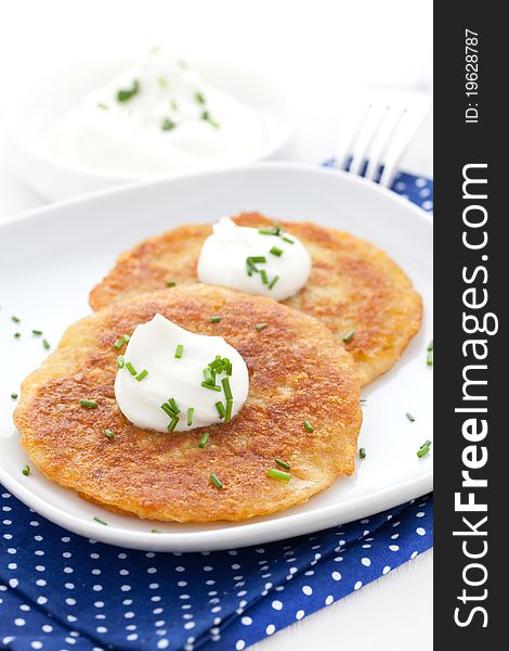 Potato pancakes with sour cream