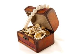 Chest With Coins And Large Pearls Royalty Free Stock Photos