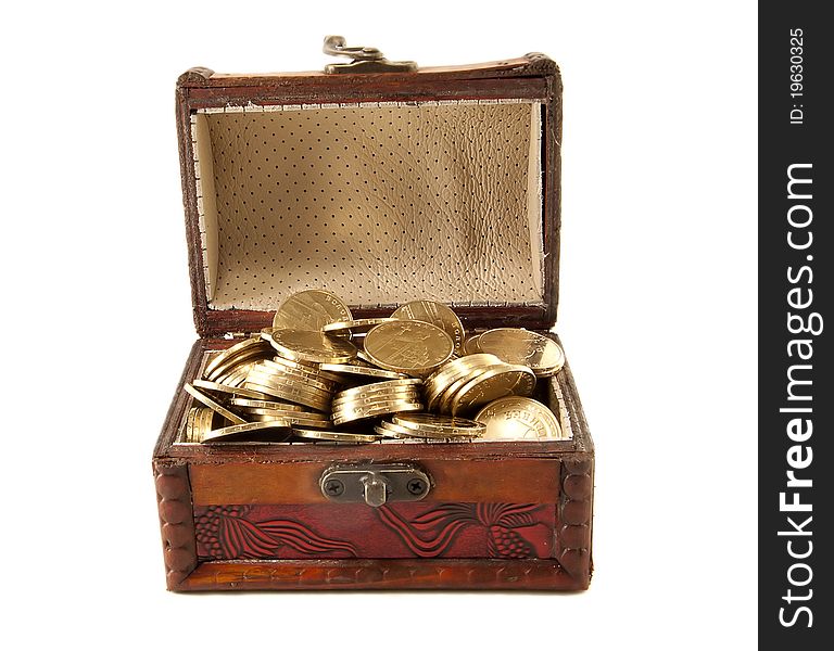 Open an old trunk with metal coins isolated on white background. Open an old trunk with metal coins isolated on white background