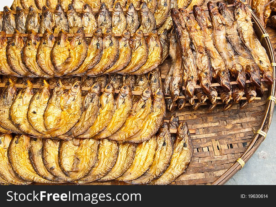 Dry Sheatfish, in a circle on bamboo plate,Siluridae