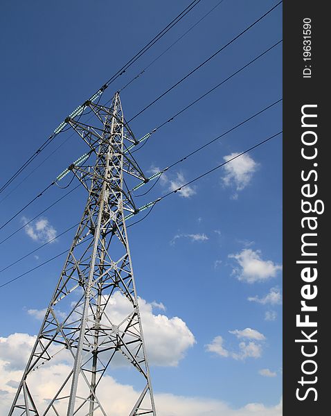 Electricity pole on blue sky background. Electricity pole on blue sky background