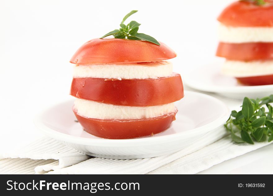 Caprese salad with tomatoes, mozzarella and basil