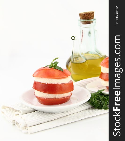 Caprese salad with tomatoes, mozzarella and basil