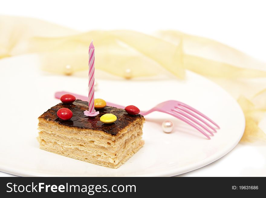 Delicious birthday cake with candle