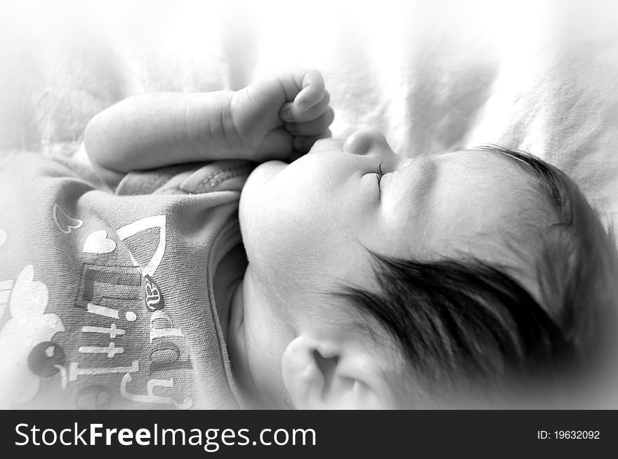 Profile of baby's face in black and white