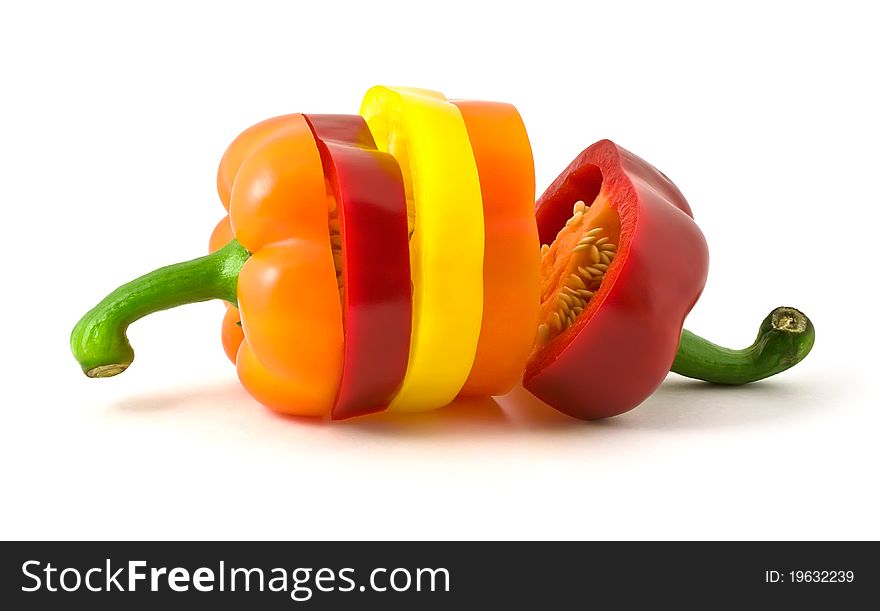 Color parts of bulgarian pepper isolated on white background