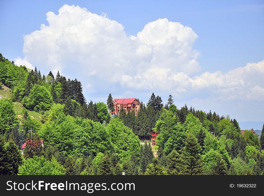 Chalet in the forest on mountain top