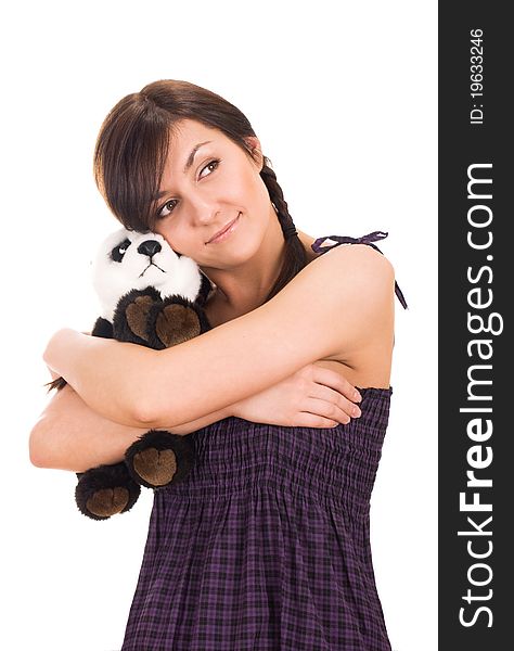 Portrait of a beautiful young woman with toy