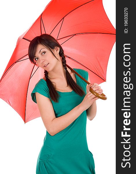 Portrait of a beautiful young woman holding red umbrella