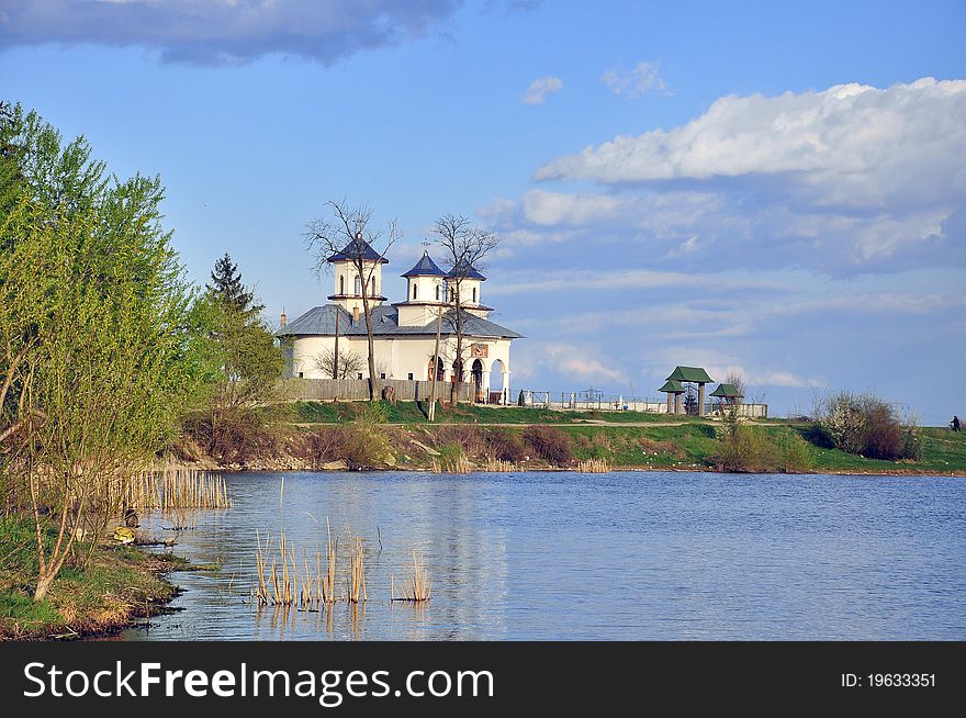 Bratesti church near the lake in targoviste city of romania. Targoviste is the former capital of romania and the city of dracula