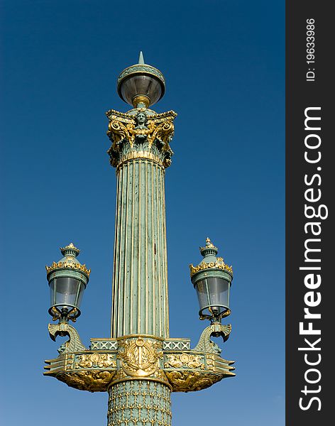 Detail of artistic lamppost in the Place de la Concorde. The Place de la Concorde is one of the major public squares in Paris, France. Detail of artistic lamppost in the Place de la Concorde. The Place de la Concorde is one of the major public squares in Paris, France.