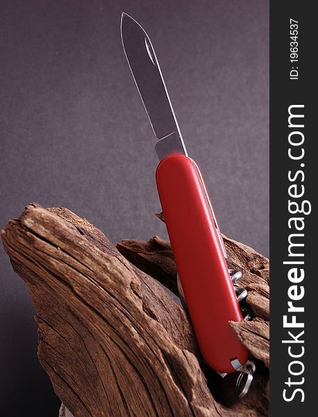 Swiss Army Knife And Wood