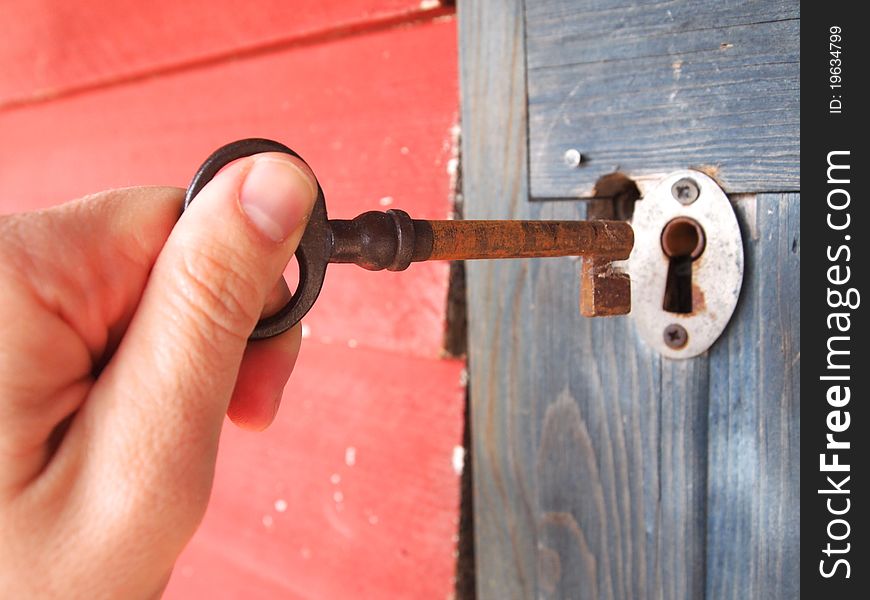 Opening a door with an old rusty key