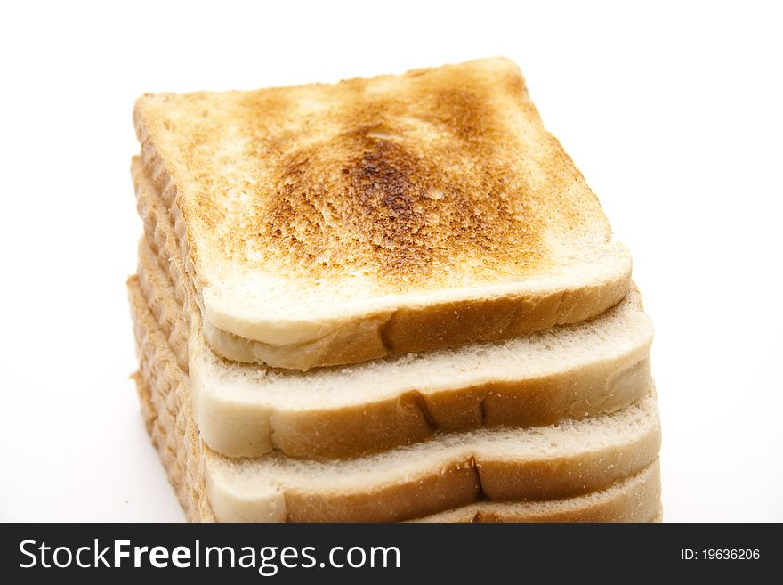 Toast brown baked and onto white background