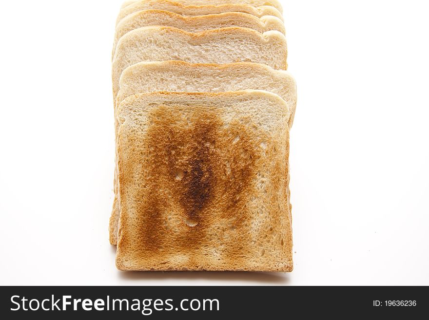 Toast brown baked and onto white background