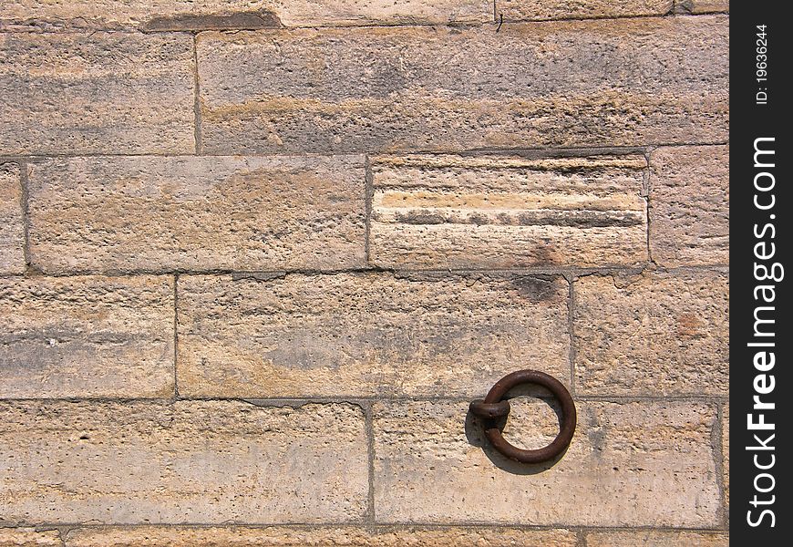 Stone wall with mooring ring