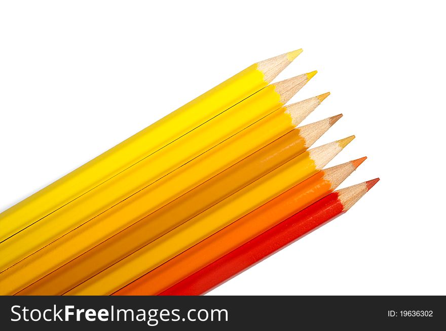 Set of colored pencils, yellow-orange palette isolated