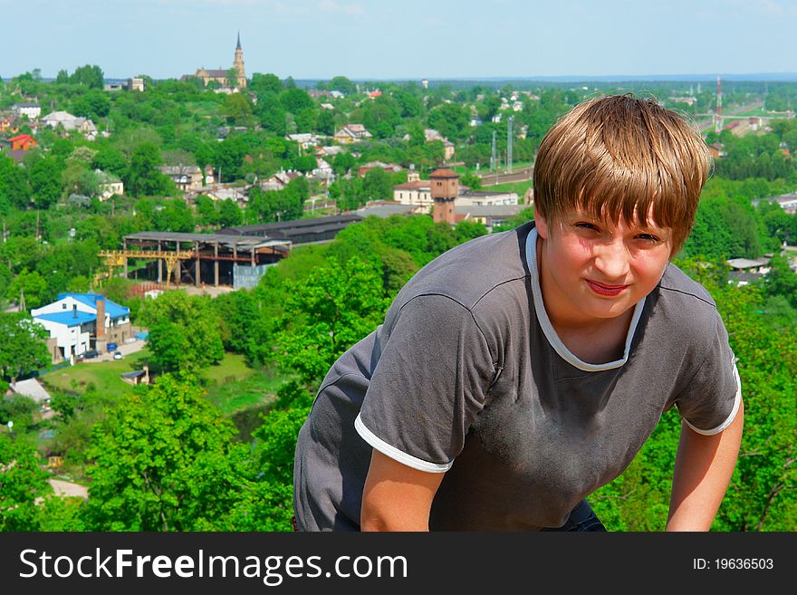 Portrait of a boy with cityscape on the background. Portrait of a boy with cityscape on the background