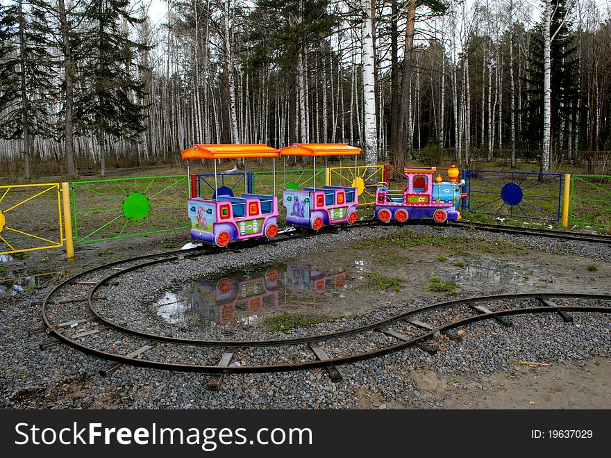 A small locomotive for children amusement. Empty and sad.