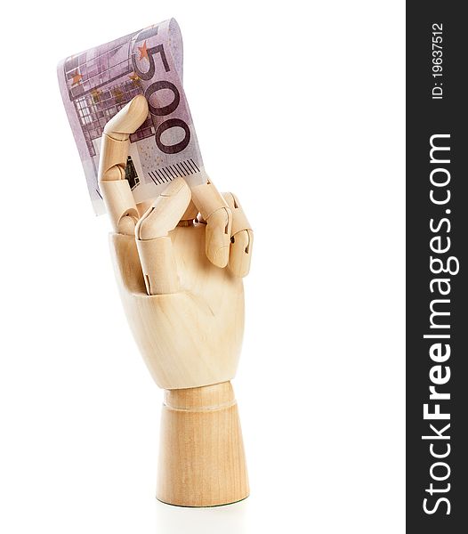 A wooden hand with 500 euro. Isolated on a white background