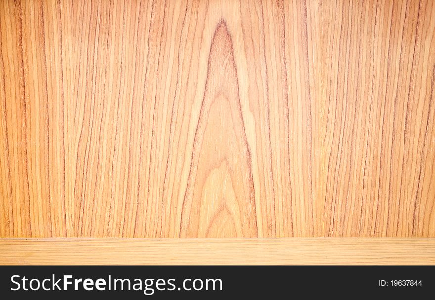 Empty wood shelf on wooden wall for background