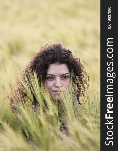 Photo of girl in green wheat field