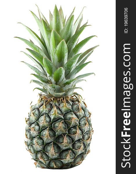 Green pineapple isolated on white