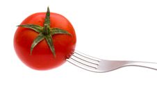 Red Tomato On A Plug Isolated Royalty Free Stock Images