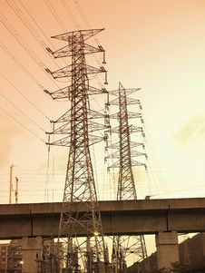 Sunset And Electric Towers Stock Photography
