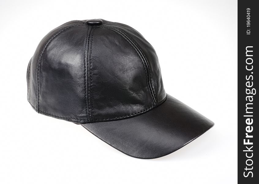 Black leather cap isolated on white