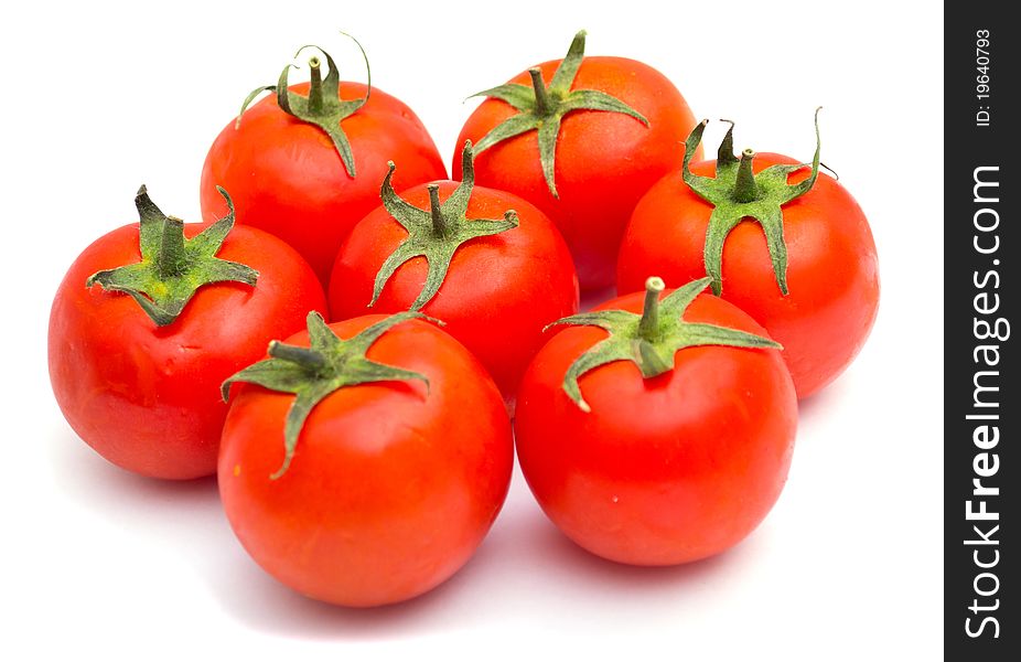 Red tomatoes isolated on a white background