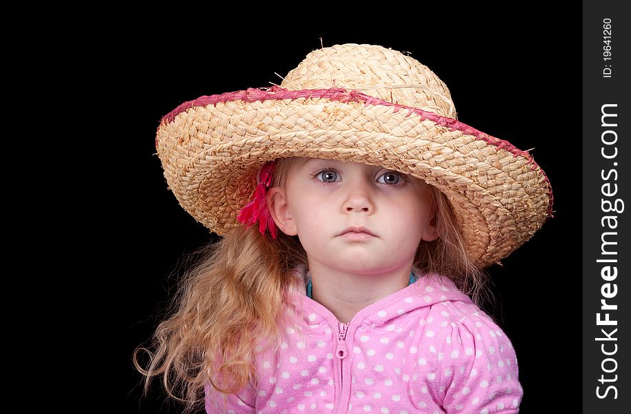An amazing image of an adorable girl wearing a hat. An amazing image of an adorable girl wearing a hat.