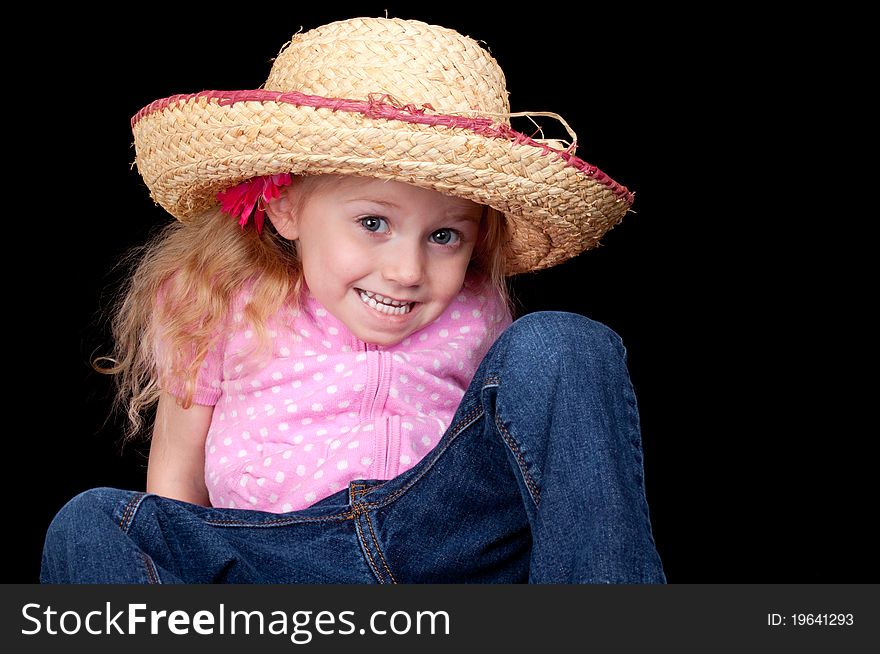 An amazing image of an adorable girl wearing a hat. An amazing image of an adorable girl wearing a hat.