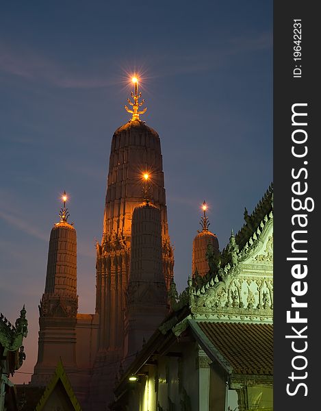 Pagoda in twilight at Wat Mahathat Phetchaburu province Thailand