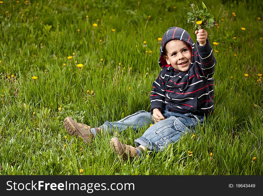 Happy boy having fun outdoors