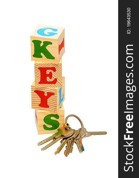 Alphabet wood blocks forming the word Keys isolated on a white background. Alphabet wood blocks forming the word Keys isolated on a white background