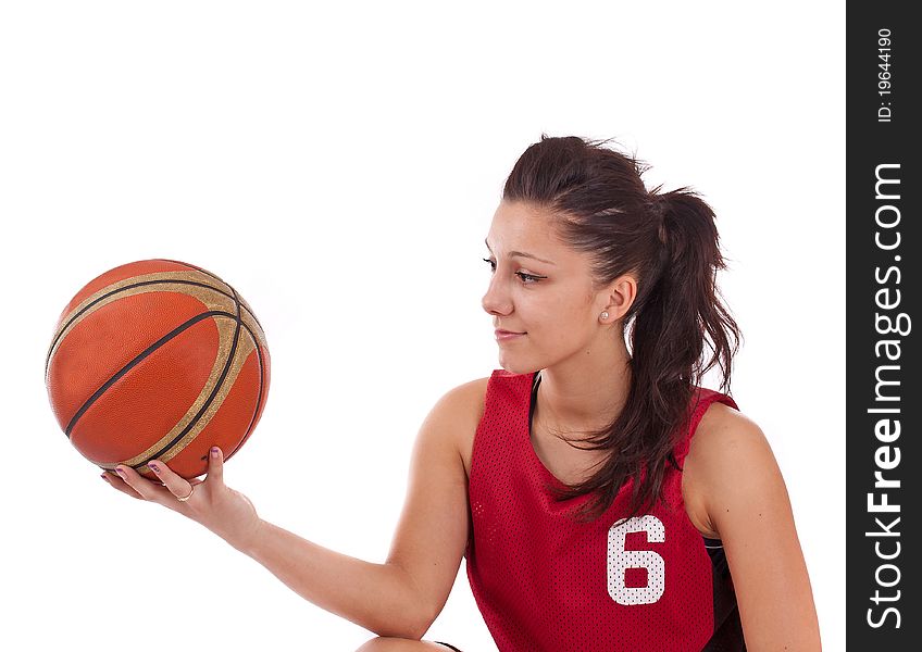 Basketball player holding basket ball, isolated on a white background