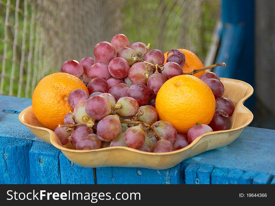 Fresh fruits rich in vitamins of a background