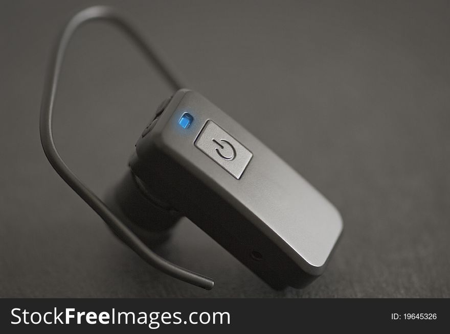 Close Up Of A Bluetooth Handsfree Device