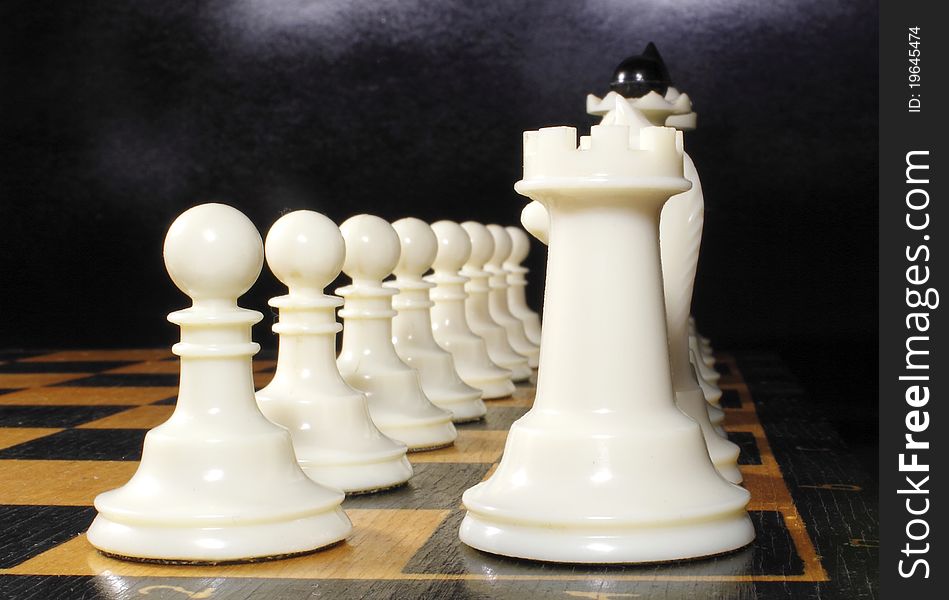 White chess on the chessboard ranked. White chess on the chessboard ranked