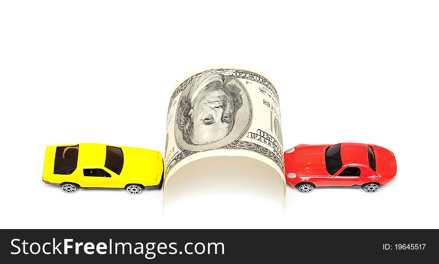 Money and car isolated on the white background