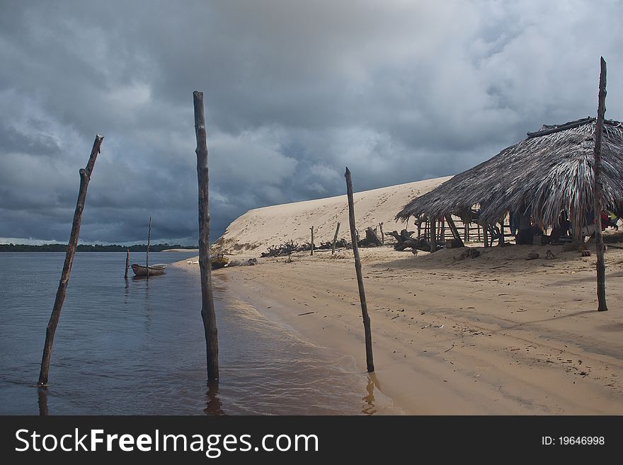 A fishermanÂ´s hut and his precious belongings by PreguiÃ§as River, MaranhÃ§ao, Brazil